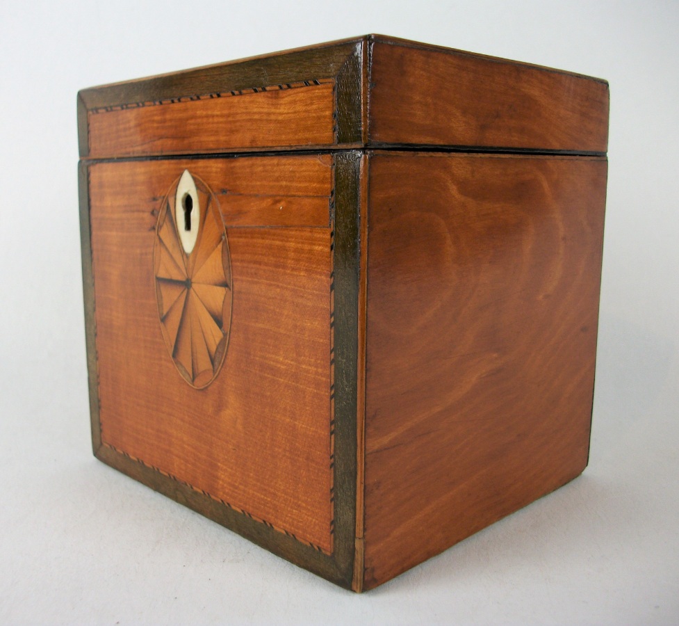 A fine Georgian period satinwood tea caddy